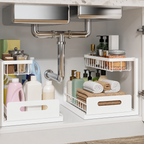 Two white two-tier pull-out organizers arranged around plumbing under a kitchen sink; items shown are not included